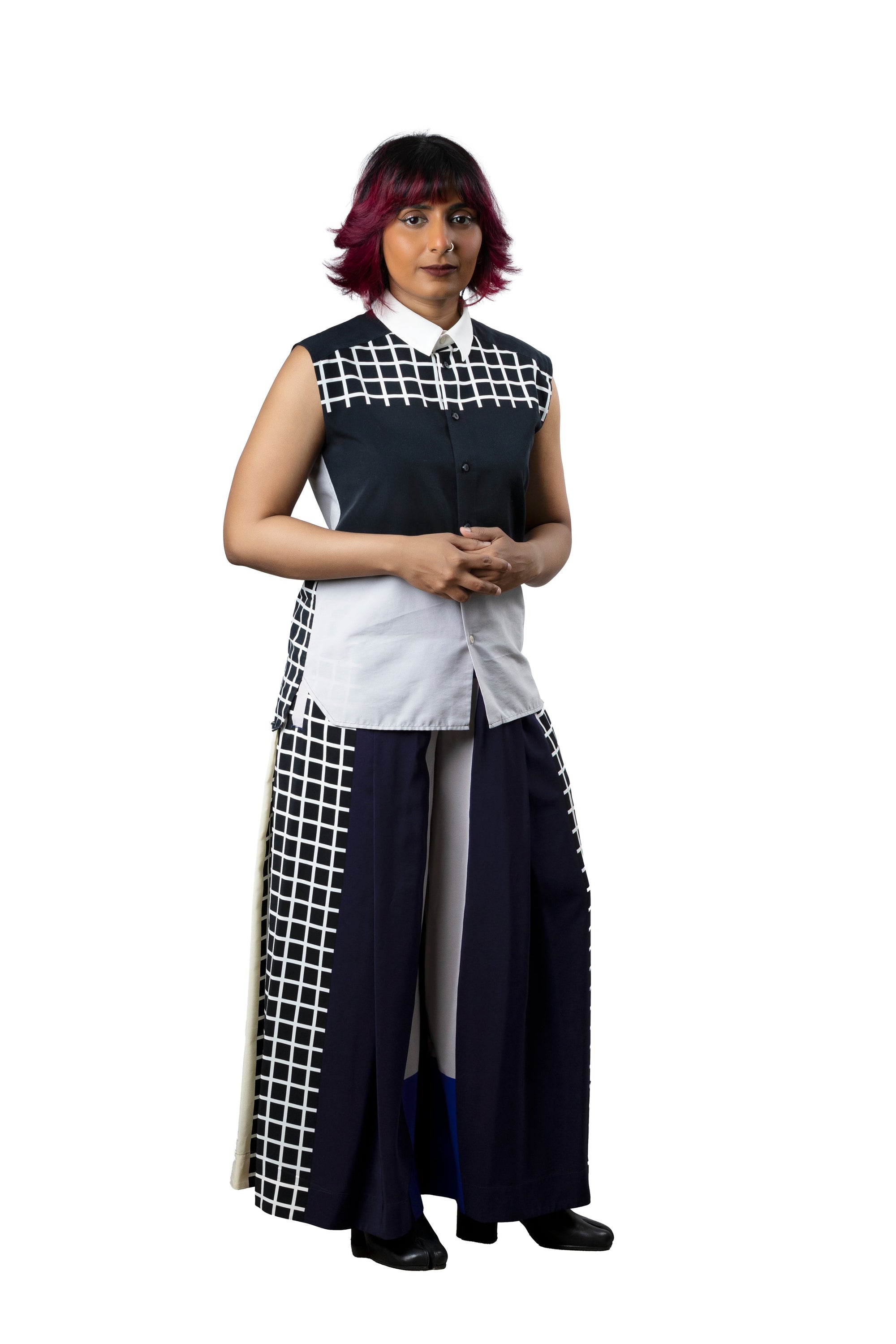 Full body picture of model wearing Issey Miyake top and pant set
